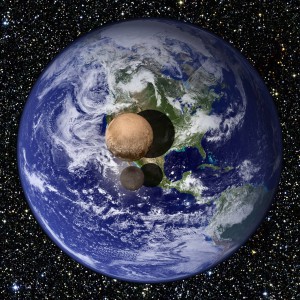 Les tailles de Pluton et Charon comparé à la Terre - © www.nasa.gov